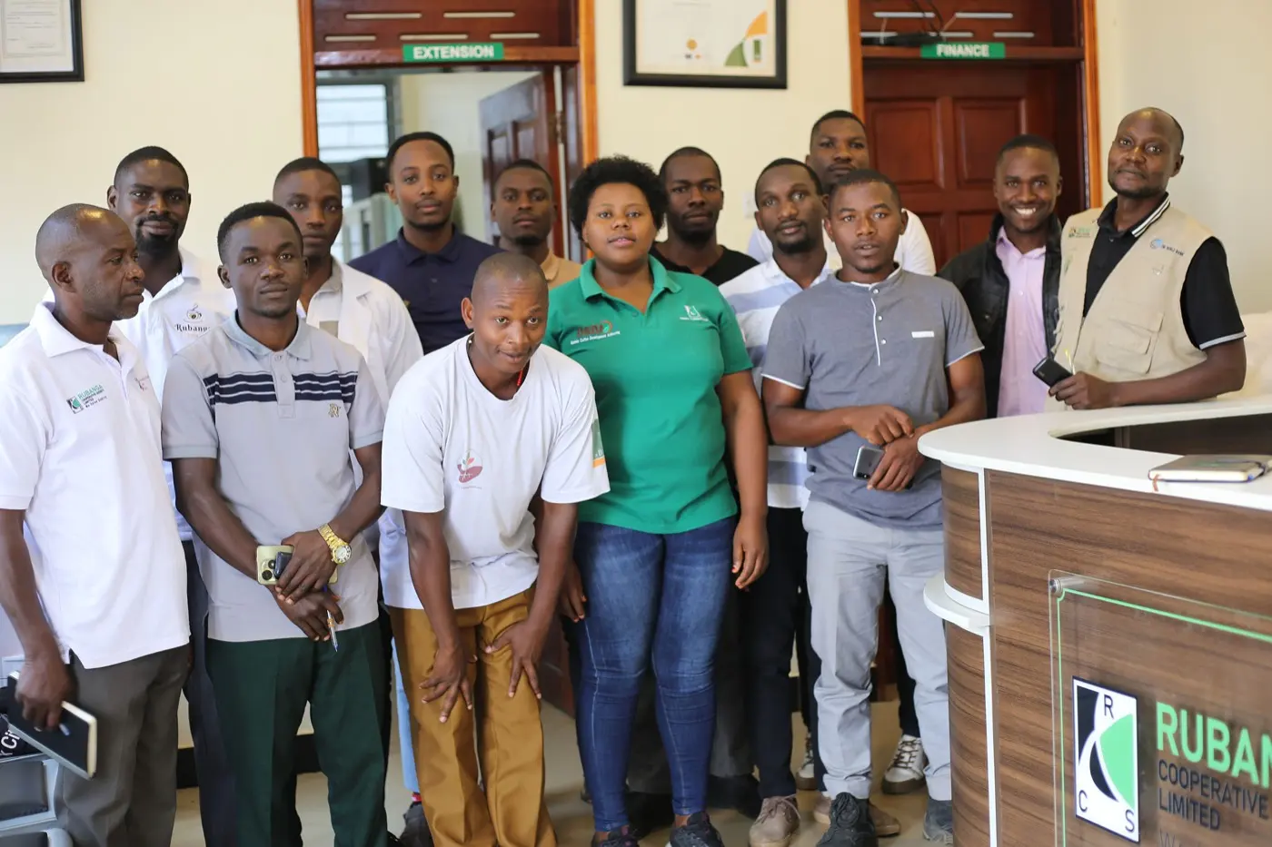 Rubanga extension officers working with a principal agricultural officer from MAAIF